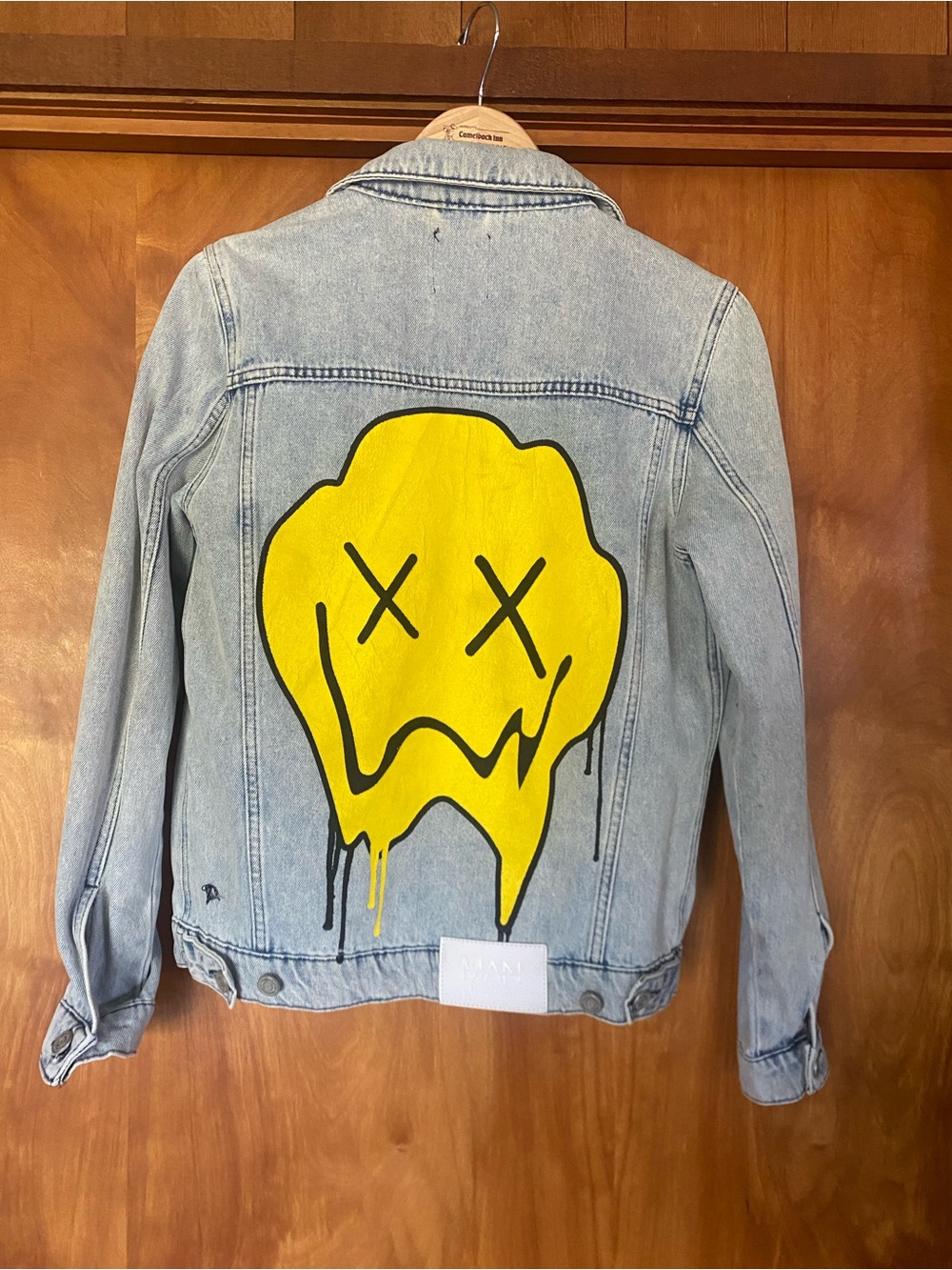 BoohooMAN Light Blue Denim Jacket with melting Smiley emoji